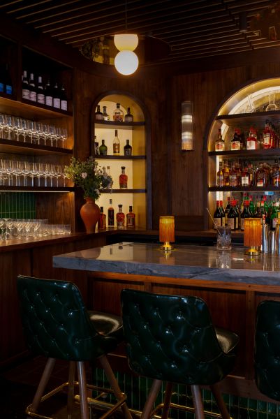 Dim lights preside over the granite bar at Nana's in Durham.