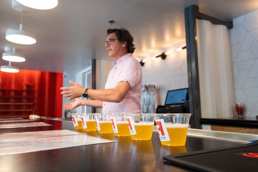 The owner of Fullsteam walks people through a tasting at the Boxyard RTP Taproom.