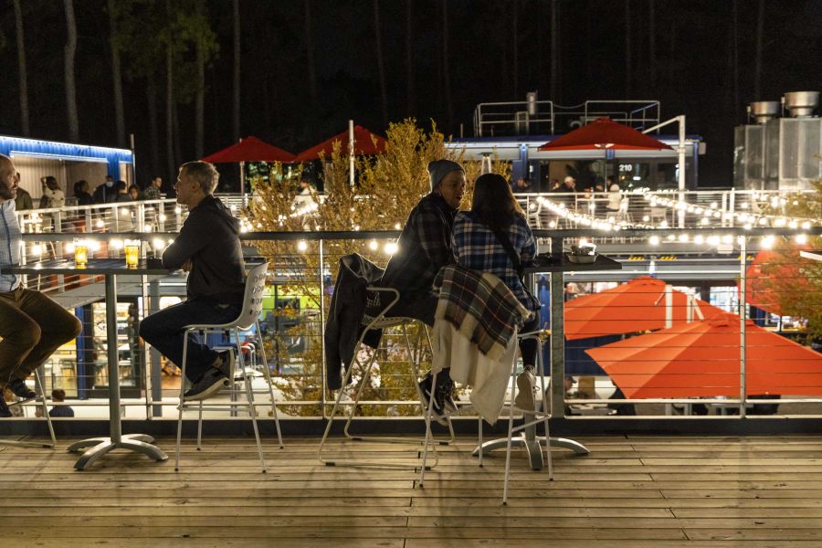 Guests enjoying the Pavilion at Boxyard RTP at night.
