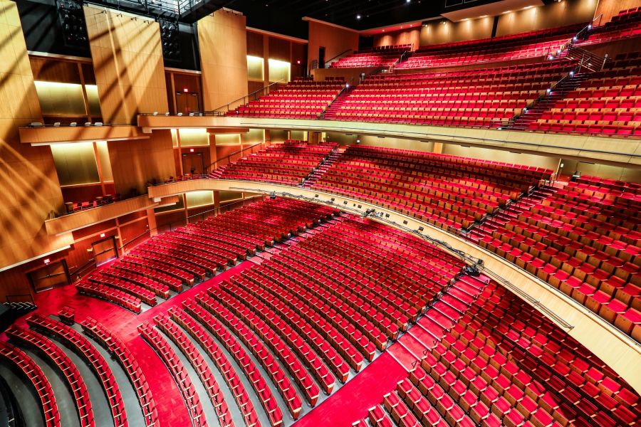 A wide-angle view displays the large amount of comfortable seating in the Durham Performing Arts Center.