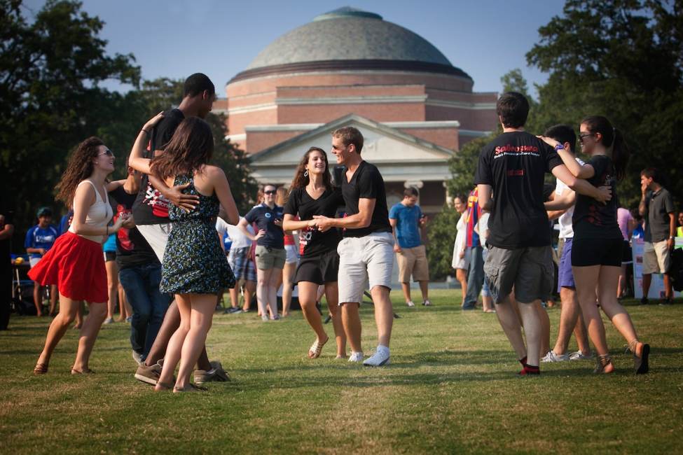 College students congregate in front of Baldwin Auditorium on Duke's East Campus.