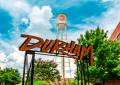 Sunlight brightens up the iconic Durham sign at American Tobacco Campus