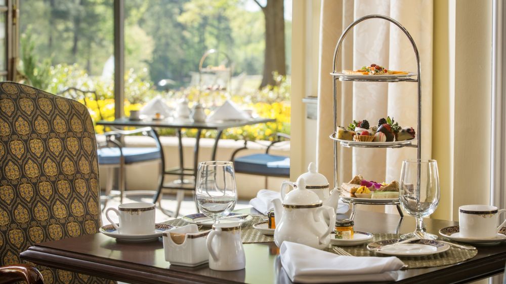 A table is set for afternoon tea at the AAA Four Diamond luxury Washington Duke Inn & Golf Club.