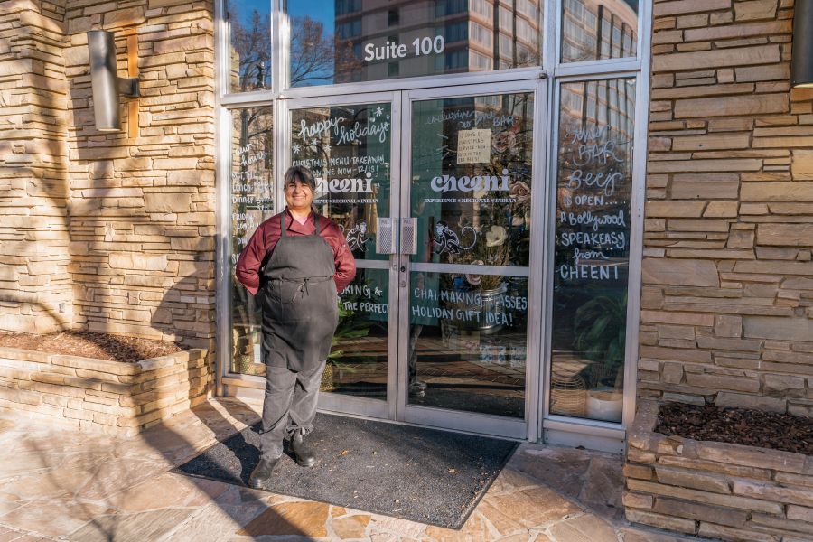 Owner Preeti Waas stands outside of Cheeni in Durham, NC.