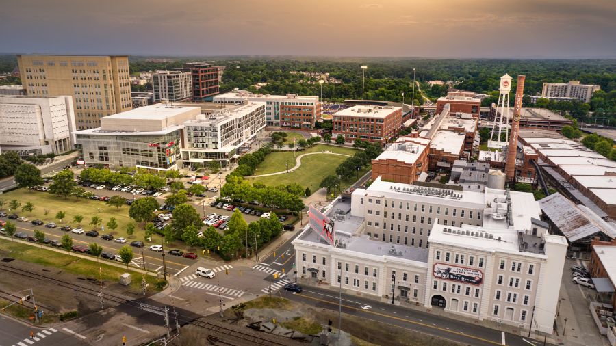 The American Tobacco Campus stretches out under a darkened sky.